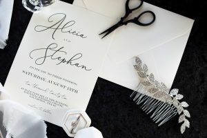 flat lay. black and white. invitation. wedding details.